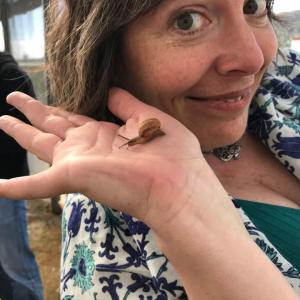 Woman enjoying a snail experience