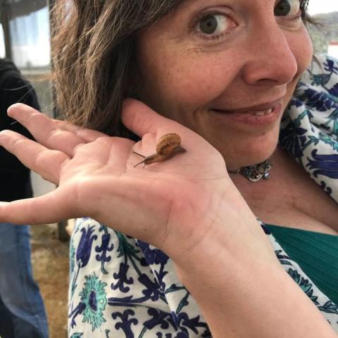 Woman enjoying a snail experience