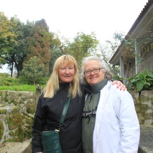 Lin Oliver standing in front of a building
