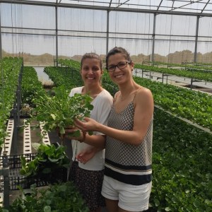 a woman standing in a garden