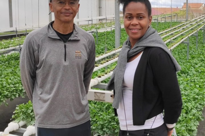 a couple of people that are standing in the street