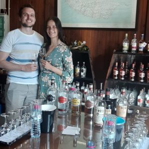 a group of people sitting at a table with wine glasses