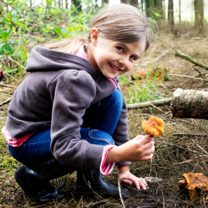 a little boy that is eating some food
