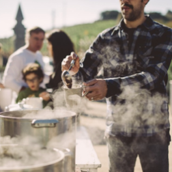 a group of people standing around each other