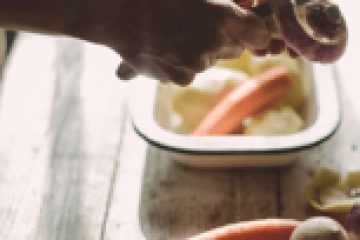 a close up of a person holding food
