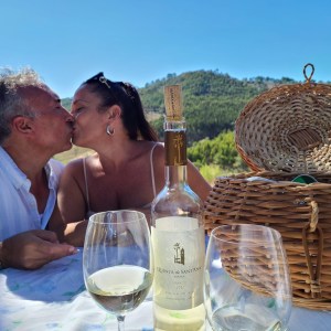 a person holding a glass of wine