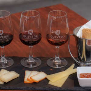 a table topped with glasses of wine