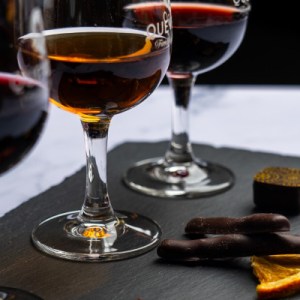 a close up of a glass of wine