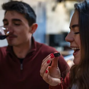 a woman holding a wine glass