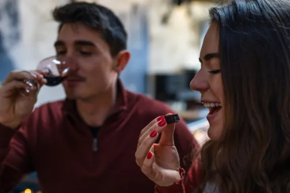 a woman holding a wine glass