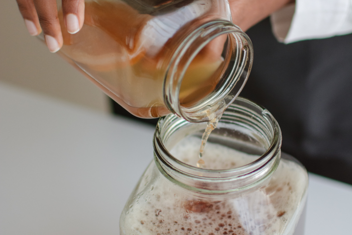 a close up of a glass cup on a table