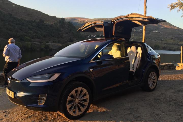 Tesla electric car in Douro Valley wine tour from Porto