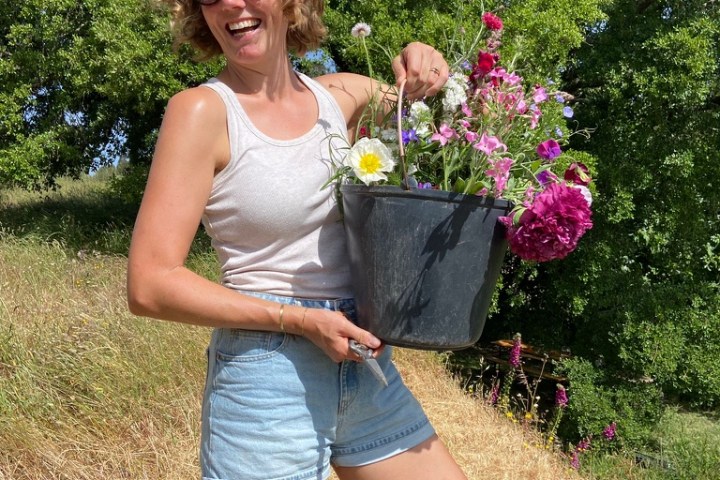 Cutting seasonal flowers during a bouquet workshop in Algarve Portugal