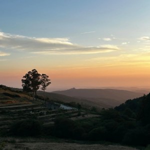 Deckchairs and private picnic setup on a Monchique hillside at sunset