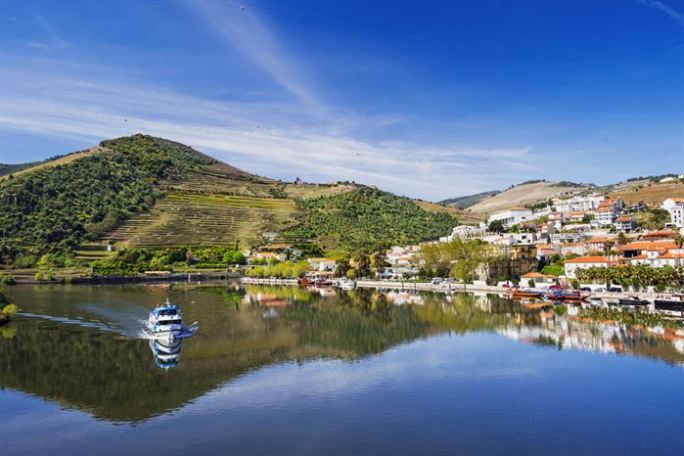 Aerial view of Pinhão village and the Douro River with terraced vineyards in Northern Portugal