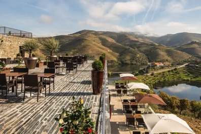 Wine guide presenting Douro Valley wines during a tasting at a historic estate