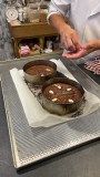 Traditional Madeira honey cake sliced on a wooden board in Funchal